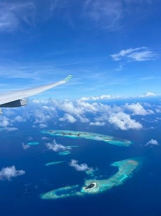 Maldivian atolls seen from a plane window